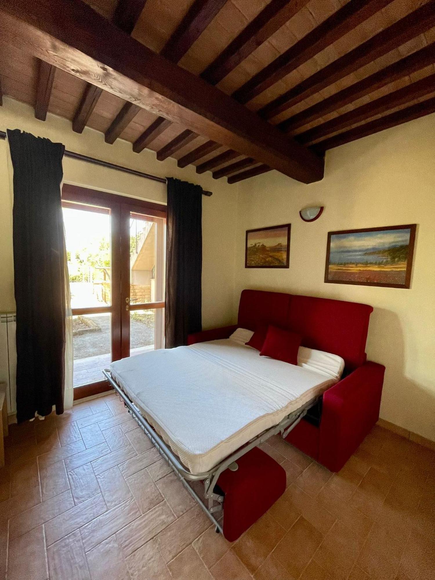 Апартаменты Saturnia House Поджио-Мурелла Экстерьер фото